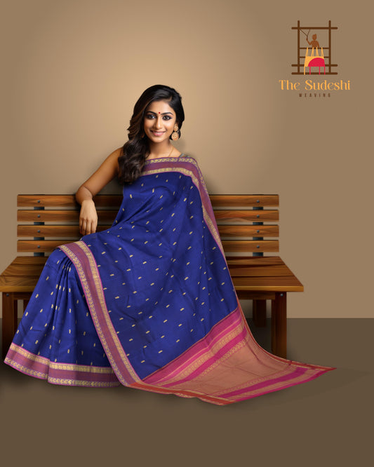 Blue Kanchipuram Silk Saree with Kalakshetra Thread Woven threadwork on the body with Annapakshi Woven contrast border and Pink Color Pallu with Annapakshi, Mango, and Zig Zag design.