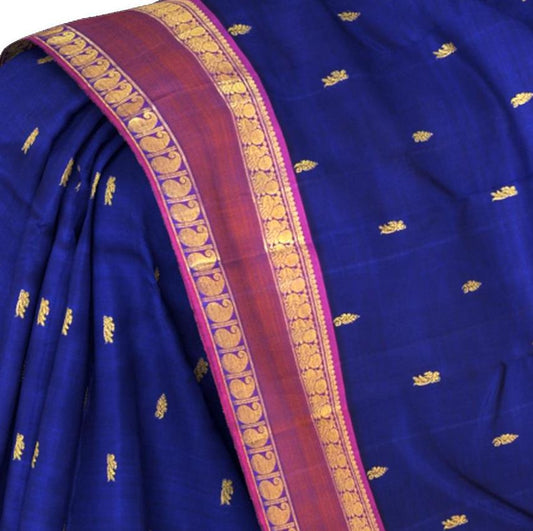 Blue Kanchipuram Silk Saree with Kalakshetra Thread Woven threadwork on the body with Annapakshi Woven contrast border and Pink Color Pallu with Annapakshi, Mango, and Zig Zag design.