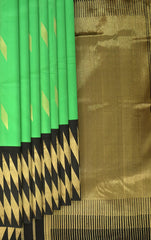 Green Plain Pure Kanchipuram Silk Saree with Diamond Butta and Black Border