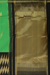 Green Plain Pure Kanchipuram Silk Saree with Diamond Butta and Black Border