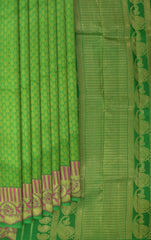 Verdant Mystique: Green Pure Silk Saree with Pink Lotus Borders
