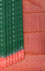 Enchantment in Green with Silver Buttas and Orange Borders Pure Silk Saree