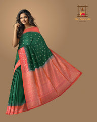 Enchantment in Green with Silver Buttas and Orange Borders Pure Silk Saree