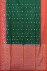 Enchantment in Green with Silver Buttas and Orange Borders Pure Silk Saree