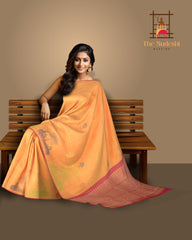 Dawn's First Light: Light Orange Saree with Pink Floral Woven Borders Pure Silk