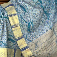 Peacock Green Kanchipuram Silk Saree with Floral Brocade – Nature-Inspired Grandeur in Every Thread