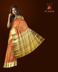 Golden Orange Kanchipuram Silk Saree with Floral Zari Brocade – A Glimmering Ode to Heritage