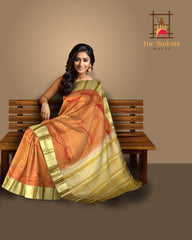 Golden Orange Kanchipuram Silk Saree with Floral Zari Brocade – A Glimmering Ode to Heritage