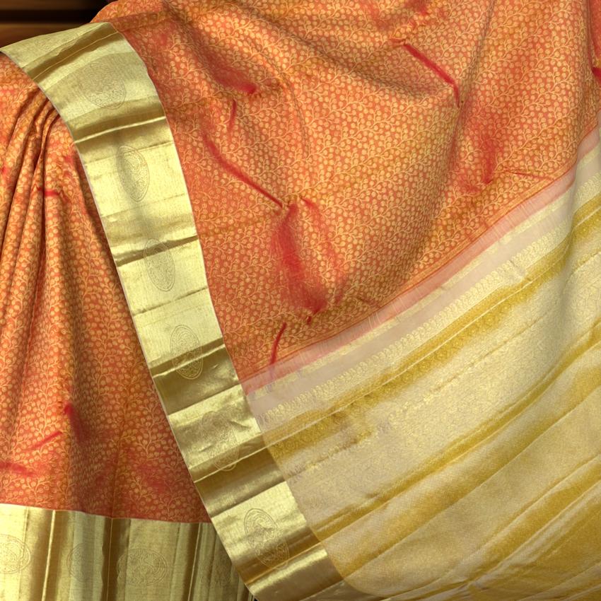 Golden Orange Kanchipuram Silk Saree with Floral Zari Brocade – A Glimmering Ode to Heritage
