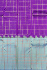 Purple Kanchipuram Silk Saree with Zari Checks and Blue-Grey Border – A Royal Classic with a Contemporary Touch