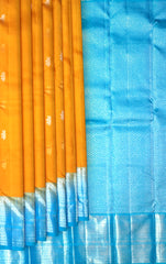 Yellow Kanchipuram Silk Saree with Gold-Silver Motifs and Light Blue Border – Sunshine Draped in Splendor