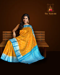 Yellow Kanchipuram Silk Saree with Gold-Silver Motifs and Light Blue Border – Sunshine Draped in Splendor