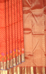 Orange Kanchipuram Silk Saree with Butta Jacquard and Floral Border – A Festive Symphony in Silk