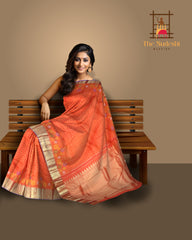 Orange Kanchipuram Silk Saree with Butta Jacquard and Floral Border – A Festive Symphony in Silk