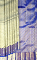 Off-White Kanchipuram Silk Saree with Floral Jacquard and Blue Border – Ethereal Elegance in Every Thread