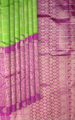 Half and Half Kanchipuram Silk Saree in Parrot Green and Pink with Checks and Parrot-Floral Motifs – A Playful Symphony in Silk