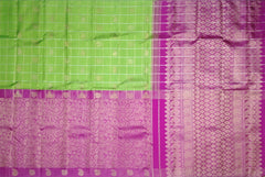 Half and Half Kanchipuram Silk Saree in Parrot Green and Pink with Checks and Parrot-Floral Motifs – A Playful Symphony in Silk