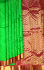 Green Jacquard Kanchipuram Silk Saree with Maroon Border – Earthy Tones Woven with Royal Charm