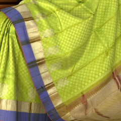 Light Green Jacquard Kanchipuram Silk Saree with Blue Motif Border – A Refreshing Blend of Grace and Tradition
