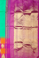 Sea Green Kanchipuram Silk Saree with Pink-Orange Zigzag Border and Triangle Motif Checks – A Vibrant Celebration in Silk