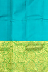 Turquoise Blue Kanchipuram Silk Saree with Long Floral Border – A Serene Drape of Subtle Splendor