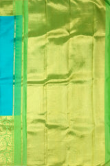 Turquoise Blue Kanchipuram Silk Saree with Long Floral Border – A Serene Drape of Subtle Splendor