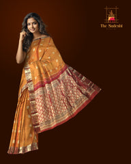 Rust Orange Kanchipuram Silk Saree with Red Floral Jacquard – A Fiery Expression of Tradition and Elegance