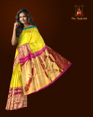 Ochre Yellow Kanchipuram Silk Saree with Ganga Jamuna Pink-Blue Border – A Vivid Contrast of Cultural Grandeur