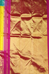 Ochre Yellow Kanchipuram Silk Saree with Ganga Jamuna Pink-Blue Border – A Vivid Contrast of Cultural Grandeur