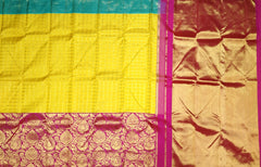 Ochre Yellow Kanchipuram Silk Saree with Ganga Jamuna Pink-Blue Border – A Vivid Contrast of Cultural Grandeur