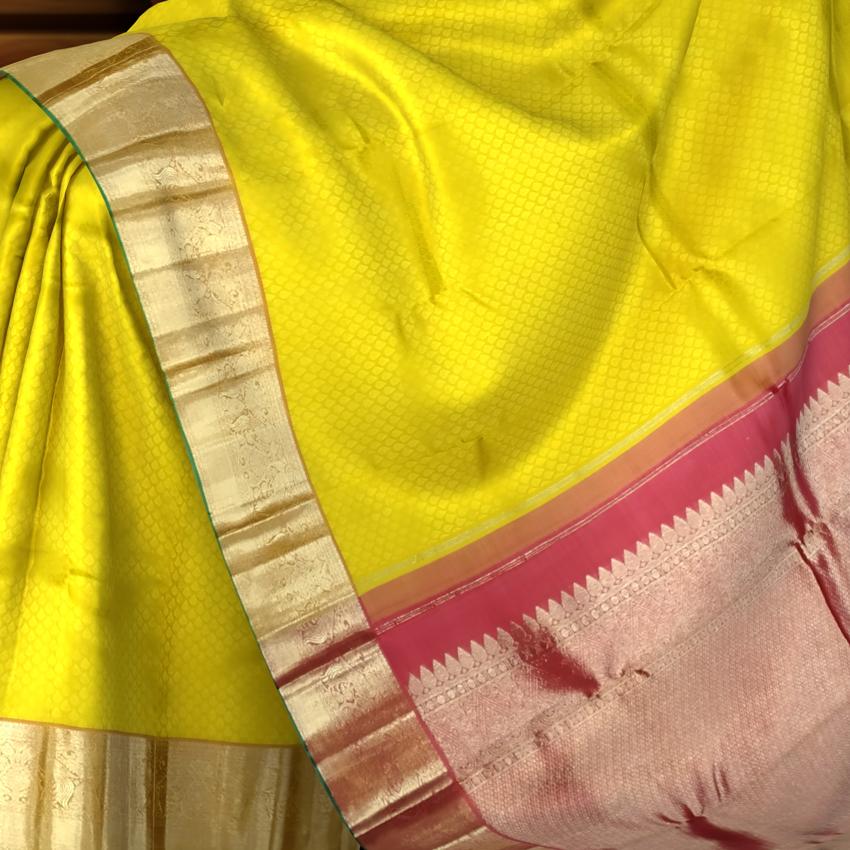 Lemon Yellow Kanchipuram Silk Saree with Red Border and Green Selvedge – A Refreshing Twist on Timeless Tradition