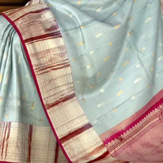 Steel Grey Kanchipuram Silk Saree with Silver and Gold Bhuttas and Terracotta Border