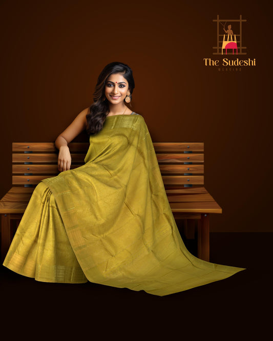 Mustard Kanchipuram Silk Saree with floral and jacquard designs on the body with self lotus border and rudraksham, ashwa motif, and temple designs in pallu