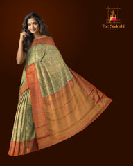 Gold Kanchipuram tissue Silk Saree with multicolor floral embossed designs on the body with red contrast border and diamond design pallu with floral motif