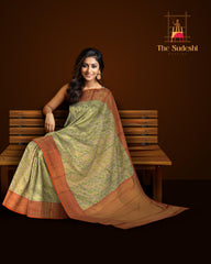 Gold Kanchipuram tissue Silk Saree with multicolor floral embossed designs on the body with red contrast border and diamond design pallu with floral motif