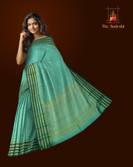 Light Green Kanchipuram Silk Saree with vertical rudraksham design on the body with dark green contrast border and annam, leaf, benarspet designs in pallu