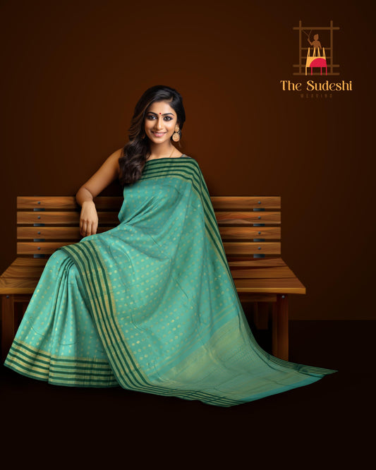 Light Green Kanchipuram Silk Saree with vertical rudraksham design on the body with dark green contrast border and annam, leaf, benarspet designs in pallu