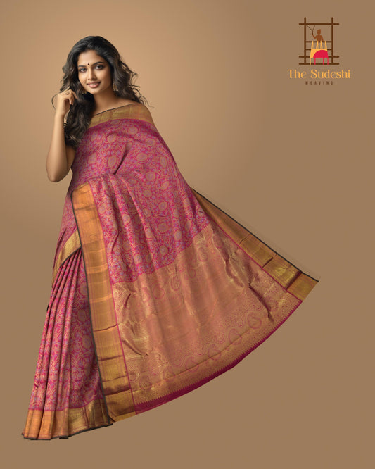 Pink Kanchipuram jacquard, embossed Silk Saree with floral motif designs on the body with self getti / kuyil kann border and floral design / kutti diamond mango motif designs in pallu