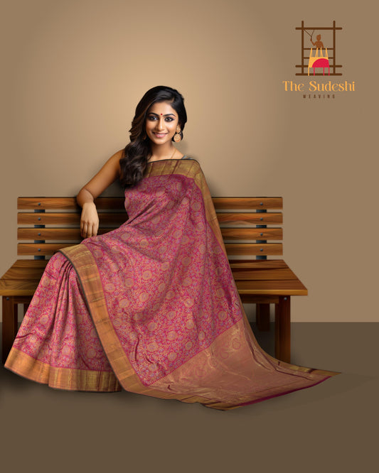 Pink Kanchipuram jacquard, embossed Silk Saree with floral motif designs on the body with self getti / kuyil kann border and floral design / kutti diamond mango motif designs in pallu