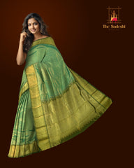 Light Green Kanchipuram Silk Saree with tissue design on the body with dark green contrast border and annam, rudraksham, varisapet intricately designed designs in pallu