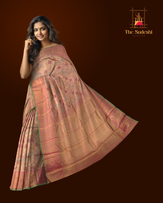 Light Baby Pink Kanchipuram Silk Saree with floral, embossed, and meenakari designs on the body with candy pink with green selvage contrast border and tear shaped motif with diamond design in pallu
