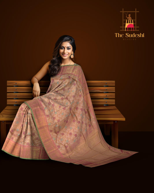 Light Baby Pink Kanchipuram Silk Saree with floral, embossed, and meenakari designs on the body with candy pink with green selvage contrast border and tear shaped motif with diamond design in pallu