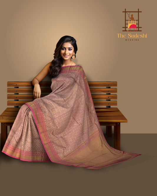 Baby Pink Kanchipuram jacquard Silk Saree with embossed and brocade designs on the body with dark candy pink contrast border and rich grand intricately designed pallu