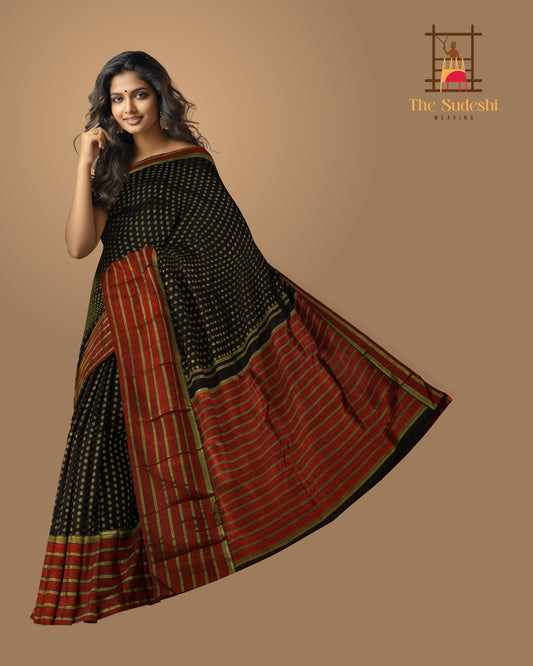Black Kanchipuram Silk Saree with vertical chakram butta, brocade design on the body with red contrast border and rope design with red threadwork pallu