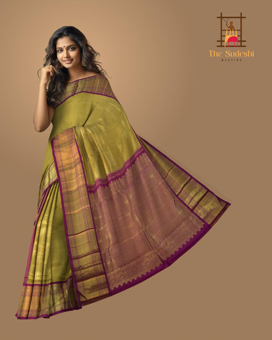 Gold Kanchipuram Silk Saree with Tissue on the body with purple, vaada malli contrast border and pallu featuring peacock, grand, intricately designed
