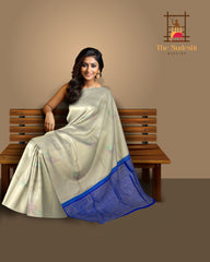 Elegant Beige Kanchipuram Silk Saree with Majestic Peacock Threadwork