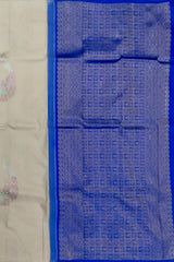 Elegant Beige Kanchipuram Silk Saree with Majestic Peacock Threadwork