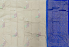 Elegant Beige Kanchipuram Silk Saree with Majestic Peacock Threadwork