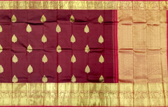 Rich Maroon Kanchipuram Silk Saree with Traditional Butta Motifs