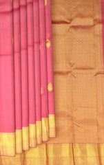 Graceful Coral Pink Kanchipuram Silk Saree with Delicate Butta Motifs
